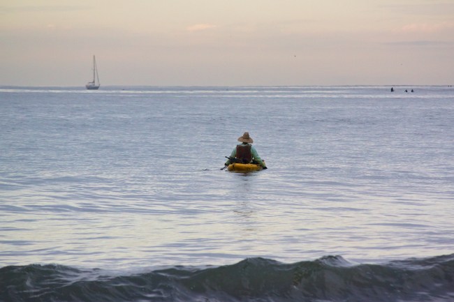 kayaker heading out to sea